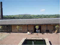 courtyard with pendle.jpg (169579 bytes)